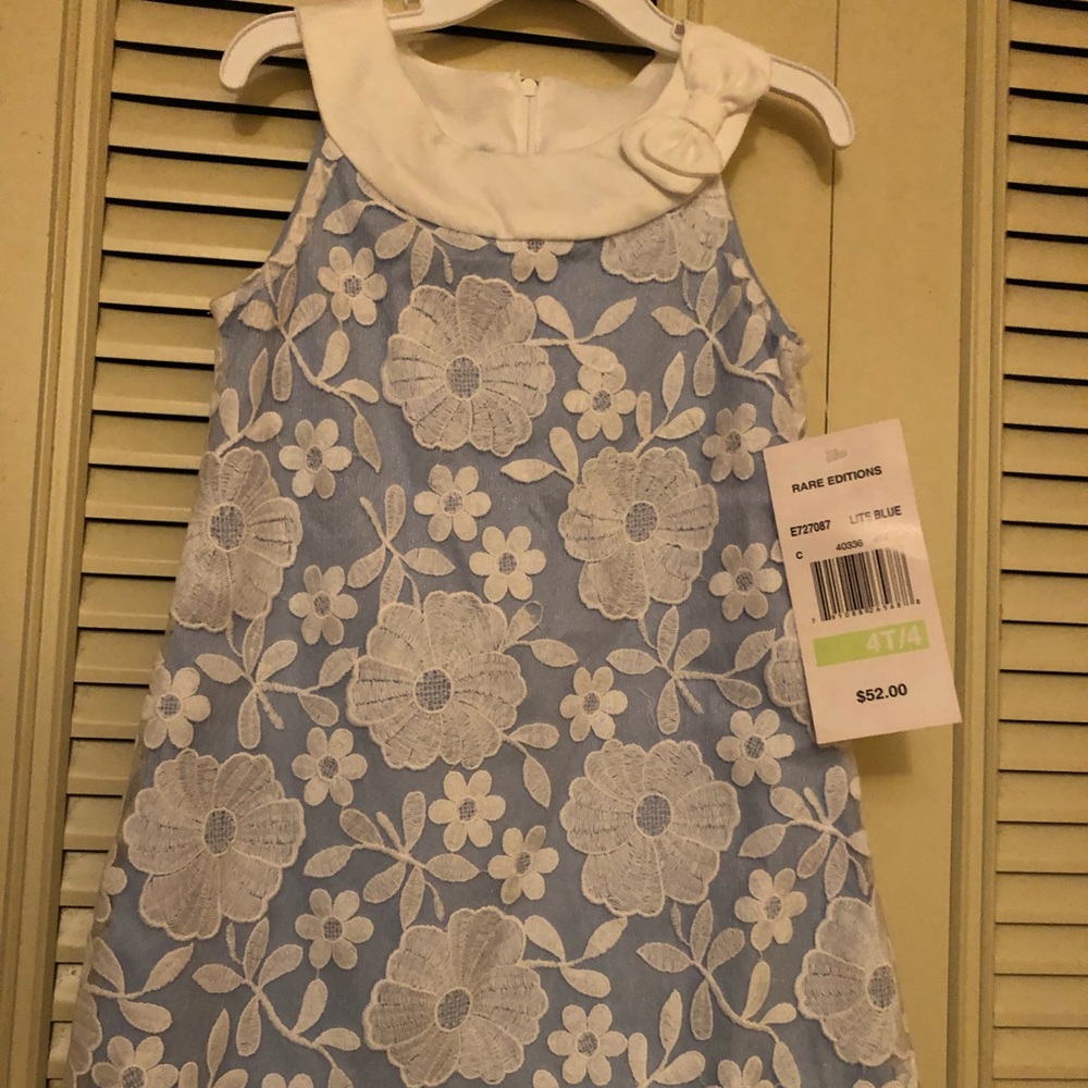 Girl’s light blue dress by Rare Editions
